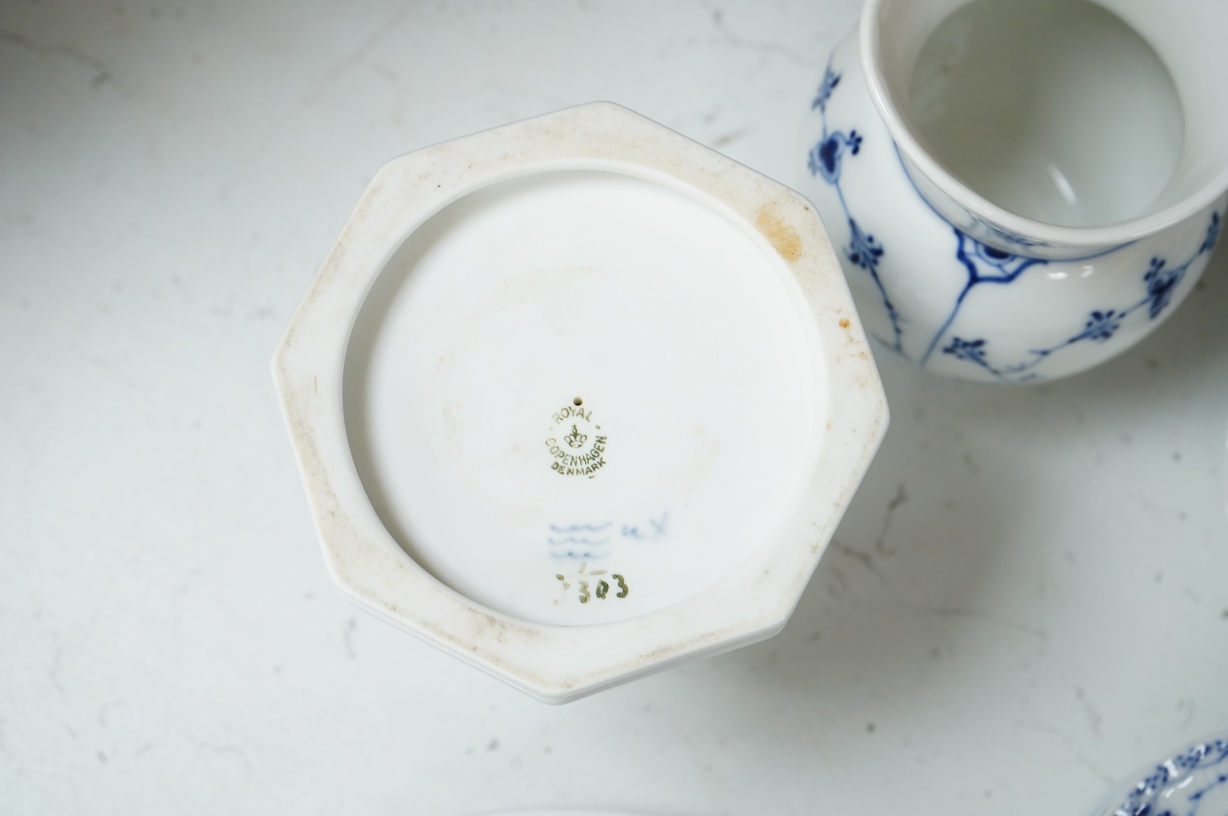 A collection of Royal Copenhagen and Bing & Grondahl onion pattern blue and white tableware